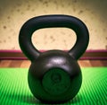 Kettlebell on a green yogamat