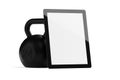 Kettlebell with tablet computer on white background with copy space, online fitness video or application template