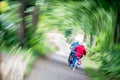 Kettwig, Germany - Old Couple Biking Together in a Park : Abstract View with Turned Lens