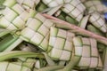 Ketupat, dumpling made of woven palm leaf stuffed with rice Royalty Free Stock Photo