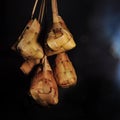 Ketupat rice dumpling on black background