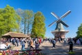 Keukenhof, Netherlands - May, 2018: Blooming colorful tulips flowerbed in public flower garden Keukenhof with windmill. Popular to Royalty Free Stock Photo