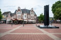 Kevelaer, North Rhine-Westphalia, Germany - Perspective view over the village square with a fountain and local restaurants