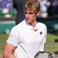 Kevin Anderson, South African player, holding his plate on centre court as runner up in the Wimbledon mens finals