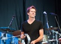 Kevin Bacon performing with The Bacon Brothers
