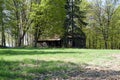 KEWADIN, MICHIGAN, UNITED STATES - MAY 16, 2018: Abandoned wooden cabin in the woods Royalty Free Stock Photo