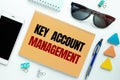 KEY ACCOUNT ANAGEMENT is written on a notepad Royalty Free Stock Photo