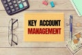 KEY ACCOUNT ANAGEMENT is written on a notepad Royalty Free Stock Photo