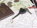 Key car with mobile phone and passport on map Royalty Free Stock Photo