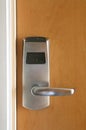 Key card electronic lock on wooden door