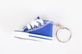 Key chain with blue mini basketball shoe miniature sneakers keychain