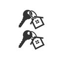 Key with key chain ring and a house pendant. House key.