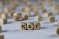 Key - cube with letters, sign with wooden cubes Royalty Free Stock Photo