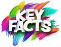 Key facts paper word sign with colorful spectrum paint brush strokes over white