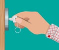 Key in hand opens wooden door. Royalty Free Stock Photo