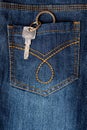 Key hanging out of back pocket of a jeans Royalty Free Stock Photo