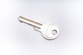 Key with metal holder on white background Royalty Free Stock Photo