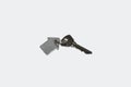 Key with homemade keychain in the shape of a house