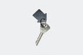 Key with homemade keychain in the shape of a house