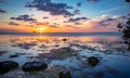 Key Largo sunset with clouds, boat and water