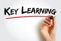 Key Learning handwritten in bold brush typography with red underline, concept for education, study, business growth, training, and Royalty Free Stock Photo