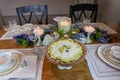 Key lime Cheesecake on an antique cake stand on a table