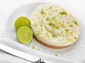 Key Lime pie with limes Royalty Free Stock Photo