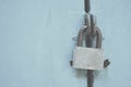 Key lock the door on blue tone background Royalty Free Stock Photo