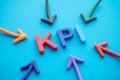 Key performance indicators KPI evaluation business management strategy concept. Color highlight arrows around KPI alphabets word