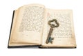 Key placed on vintage bible Royalty Free Stock Photo