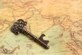 Key placed on the world map. Use as a concept solving the problem of each area Royalty Free Stock Photo