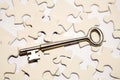 Key on puzzle pieces Royalty Free Stock Photo