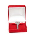 Key in red gift box isolated on white Royalty Free Stock Photo