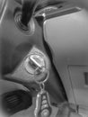 The key with the remote hanging in the slot on the cockpit of a car Royalty Free Stock Photo