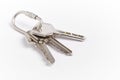 Key ring with keys over white background. Rent Royalty Free Stock Photo