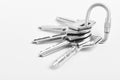 Key ring with keys over white background. Rent Royalty Free Stock Photo