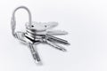 Key ring with keys over white background. Rent Royalty Free Stock Photo