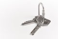 Key ring with keys over white background. Rent Royalty Free Stock Photo