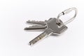 Key ring with keys over white background. Rent Royalty Free Stock Photo