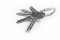 Key ring with keys over white background. Rent Royalty Free Stock Photo