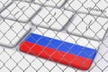 Key with Russian Flag on White PC Keyboard behind the Chain Link