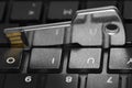 Key shape USB flash on a black computer keyboard. Royalty Free Stock Photo