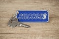 Key with a success tag Royalty Free Stock Photo