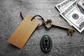 Key tag and cash Royalty Free Stock Photo