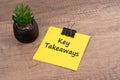 Key Takeaways words on adhesive note Royalty Free Stock Photo