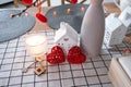Key to house of cozy home with Valentine decor on table of kitchen. Gift for valentines day, family love nest. Building, design,