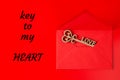 Key to my heart. Key with heart in open gift envelope, symbol of love. Greeting card for Valentine`s Day or wedding Royalty Free Stock Photo