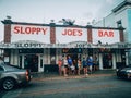 Key West, Florida, USA - January 1, 2019: American popular landmark famous touristic place Sloppy Joe`s Bar on Duval street.