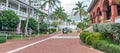 KEY WEST, USA - FEBRUARY 21, 2016: Tourists walk along city streets on a cloudy day. Key West is capital of the Keys in Florida Royalty Free Stock Photo