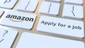 Keyboard with AMAZON company logo and Apply for a job text on the keys. Editorial conceptual 3D rendering